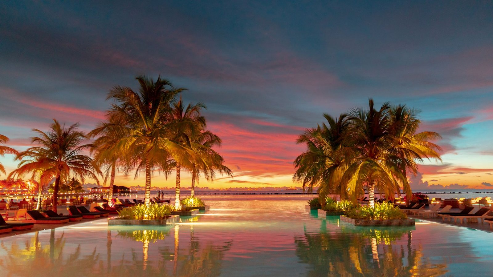 Twilight view of Capella Nuova resort pool